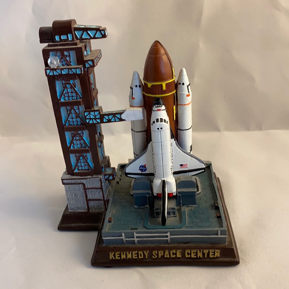 Kennedy Space Center Space shuttle figurine.
